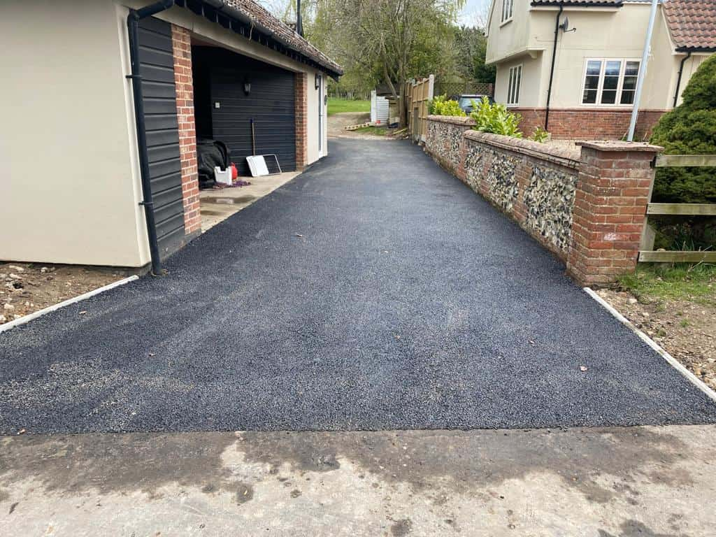 This is a newly installed tarmac driveway. All works carried out by Olney Driveways