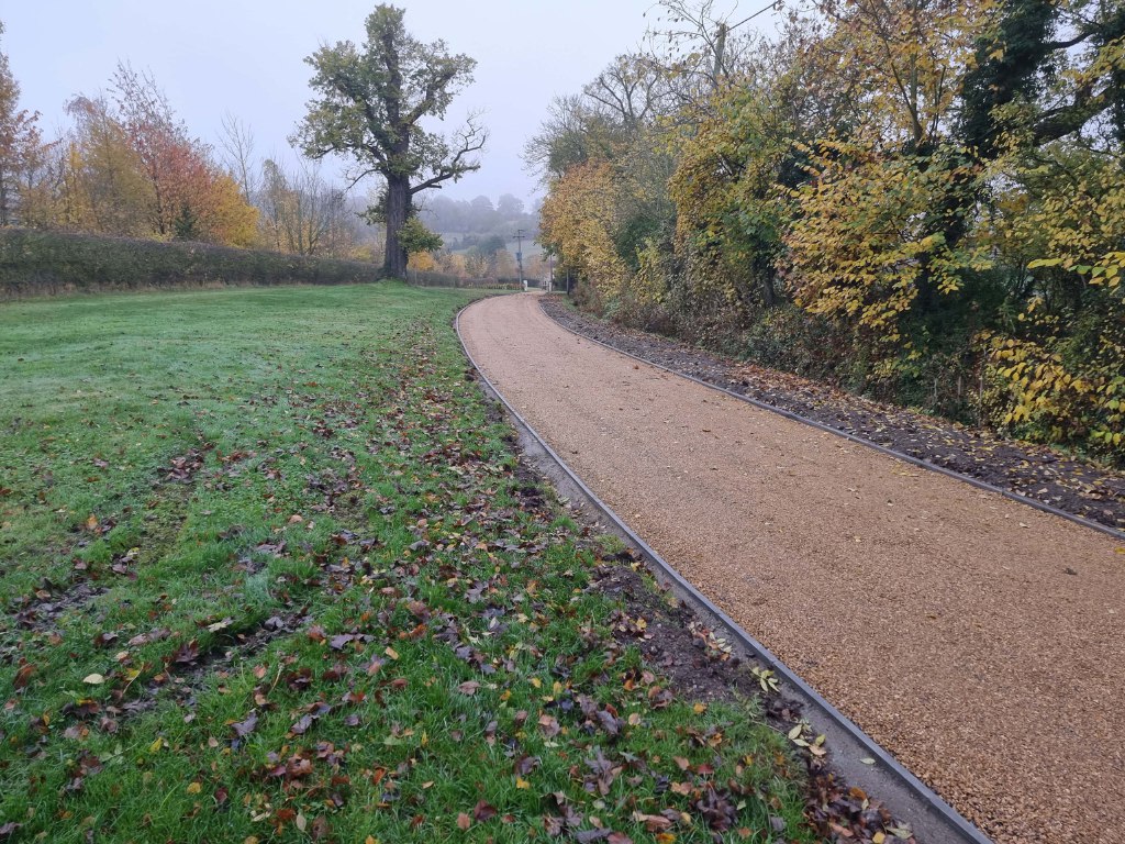 This is a large driveway which has just had a tar and chip driveway installed on by Olney Driveways
