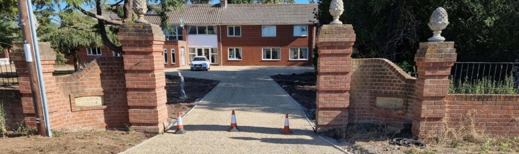 This is a photo of a newly installed chip and tar driveway, installed by Olney Driveways